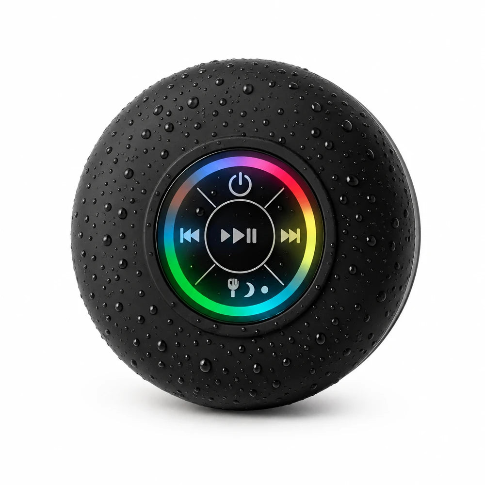 Convierte tu ducha en experiencia musical con este parlante Bluetooth impermeable con luces RGB. Adhiérelo a la pared, conecta tu celular y disfruta playlists o podcasts.